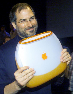 Apple Computer Chief Executive Steve Jobs poses with the company's new ...