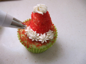 Next, add a white star border around the base of the hat. Top the hat ...