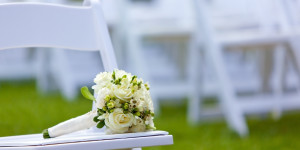 FLOWERS-ON-WEDDING-CHAIR-facebook.jpg