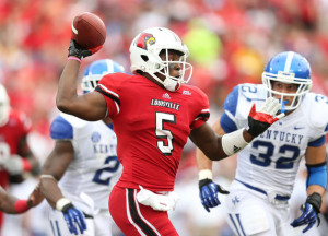Teddy Bridgewater #5 of the Louisville Cardinals throws a pass during ...