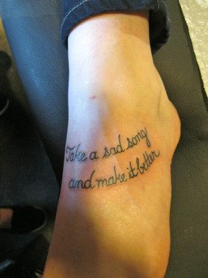 Writing On Foot Tattoo picture