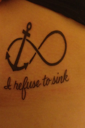 ... with tattoo quotes about strength on shoulder blade - A refuse to sink