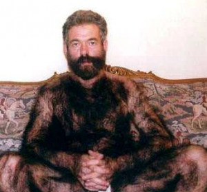 Funny Hairy Guy Blending In with Couch