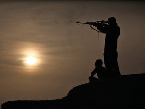 Crack! Crack! The sound of an Afghan soldier's Dragonov sniper rifle ...