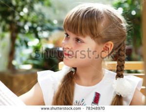 portrait of little girl sitting little baby girl holding flower