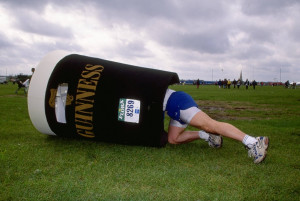 fun runner puts on his 'pint of Guinness' costume