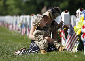 Mother and child visit fallen soldiers grave for Memorial Day; click ...
