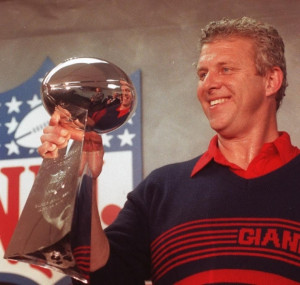 Bill Belichick Super Bowl Trophy Hoists the lombardi trophy