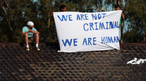 Asylum seekers on the roof of Villawood Detention Centre. Picture ...