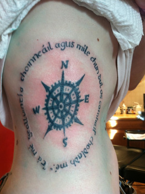 My newest addition. A quote by Robert Frost in Irish that says 