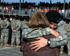 new Soldier hugs her mother at the conclusion of the Basic Training ...