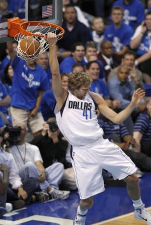 Dallas Mavericks forward Dirk Nowitzki dunks for two of his 48 points ...