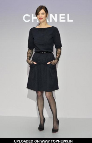 Anna Mouglalis attends the Chanel Ready To Wear Fall Winter 2012 show