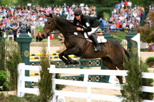... 15: Which of these two jumping photos show a better balanced horse