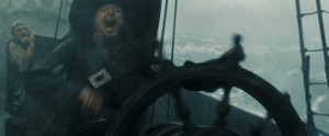 Barbossa steering the Black Pearl .