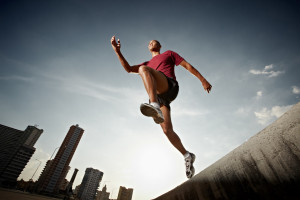 Latin american athlete running in Havana, Cuba. Horizontal shape, full ...