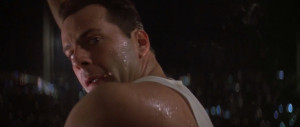 Bruce Willis as John McClane in Die Hard (1988)