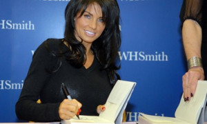 Katie Price getting into practice in 2008 signing copies of her book ...