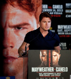 Photos: Mayweather, Canelo Go Face To Face in Houston