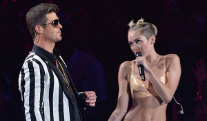 Cyrus took the stage to perform the song “Blurred Lines” with ...
