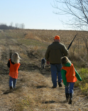 We got to their farm close to noon. The girls had their orange vests ...