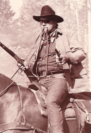 John Wayne as Rooster Cogburn