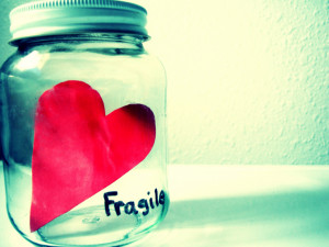 Fragile heart in jar