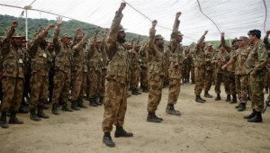 Pakistani soldiers shout 
