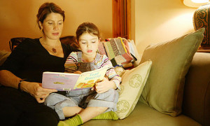 Getting them hooked ... Mother and daughter reading. Photograph: Frank ...
