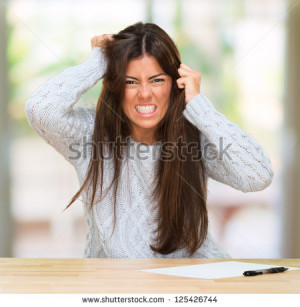 Portrait Of A Young Angry Woman at her home - stock photo