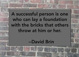 successful person is one who can lay a foundation with the bricks