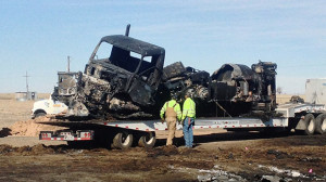 This photo shows the charred remains after a fatal wreck Sunday ...
