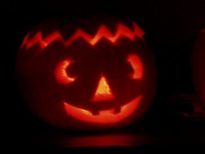 When the lights go out, the pumpkins get scary! Good and evil pumpkin.