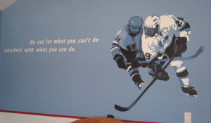 ... hockey rink, NY Rangers logo, hockey mural and quotes round out the