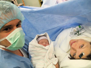 photo of Blake and Joel with Zoe moments after her birth