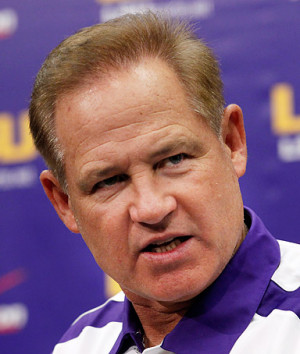 LSU head coach Les Miles talks during a news conference at NCAA ...