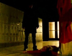 Sylar stands over a mistaken victim, Jackie Wilcox .