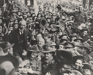 Billy Hughes being carried by soldiers along a crowded street, 1918 ...