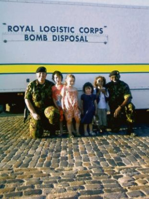 ... -Dear and Hayden Pritchard with members of the bomb disposal team