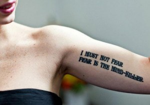 bicep quote tattoos for guys