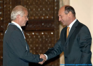 Adrian Goreac (left) receives a presidential distinction in 2007 ...