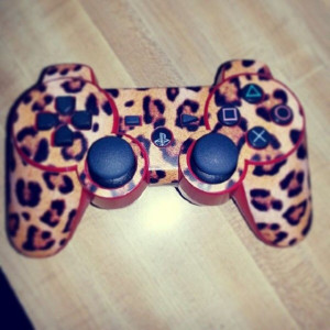 Leopard print PS3 controller stickers.