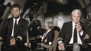 ... Jabbar (Murdock) and Peter Graves (Captain Oveur) in Airplane! (1980