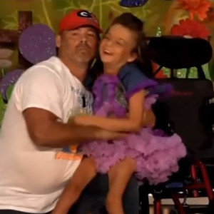 Dad Performs With His Wheel...