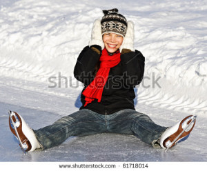 Winter Ice skating Girl having fun on ice skate rink outdoors. Cute ...