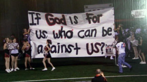 being told to stop using Bible verses on banners at football games