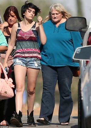 Birth father? Paris with her birth mother Debbie Rowe on Saturday, the ...
