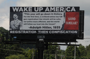 billboard that uses Adolph Hitler to warn of the dangers of gun ...