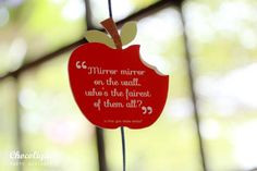 The adorable apple cuts outs with Snow White sayings on them More