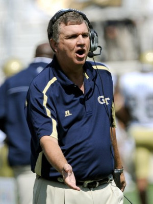 Coach Paul Johnson prepares to greet players headed to the sideline ...